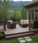 Beautifully constructed deck in a Colorado backyard, showcasing composite and wood materials with outdoor furniture